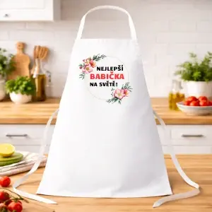Bílá kuchyňská zástěra „Nejlepší dědeček pod sluncem“. Praktický a milý dárek pro dědu, který rád vaří, griluje nebo tráví čas v kuchyni.